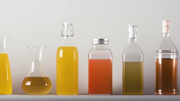 Beeldmateriaal Van Glazen Flessen Met Kleurrijke Sappen — Stockvideo