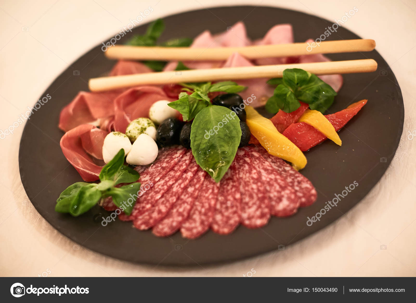 Salami and cheese platter with vegetable — Stock Photo © serdiukov