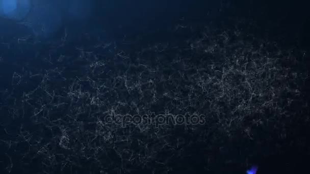 Fond vidéo Joyeux Noël dans une version moderne et technologique. L'inscription est recueillie à partir de nombreux points et lignes disparates dans l'espace. En haut de l'écran vole par une lumière vive .