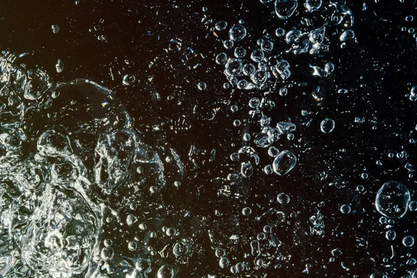 Abstract water splash with graphic motion flow bubbles above dar — Stock Photo, Image