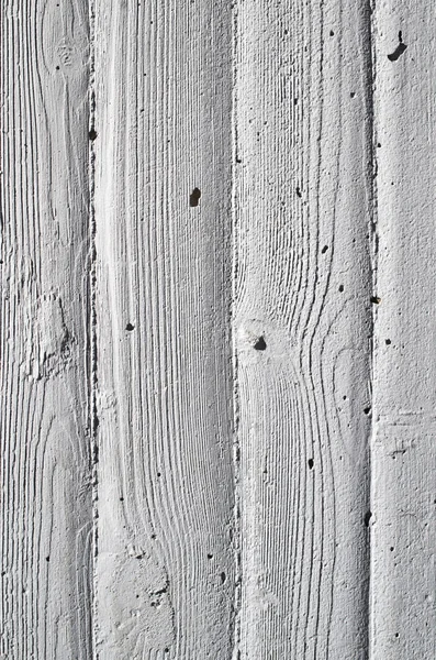 Parede de concreto com pegada de madeira — Fotografia de Stock