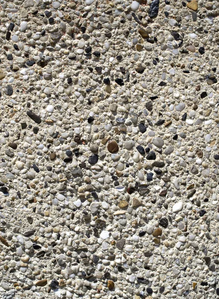 Plaster with  pebbles on wall closeup — Stock Photo, Image