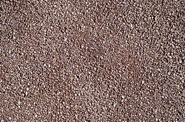 Red pebble mosaic pebbles wall closeup — Stock Photo, Image