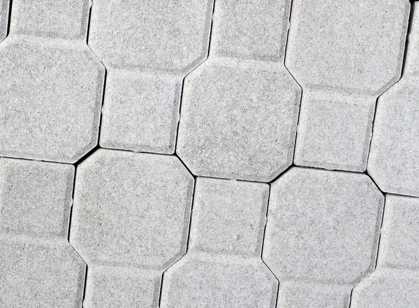 Новые бетонные блоки для мощения — стоковое фото