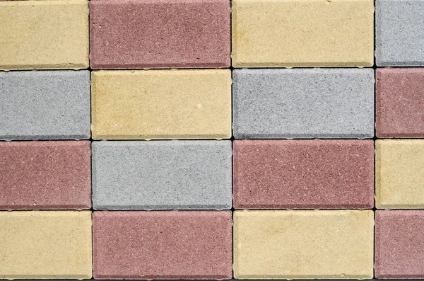 Новые красочные бетонные блоки для мощения улиц — стоковое фото
