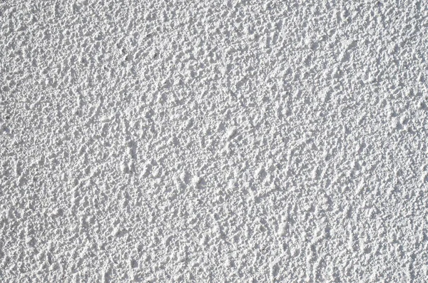 Біла декоративна рельєфна штукатурка на стіні — стокове фото