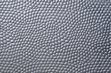 Tümsekli yüzeyi ile siyah metal plaka 