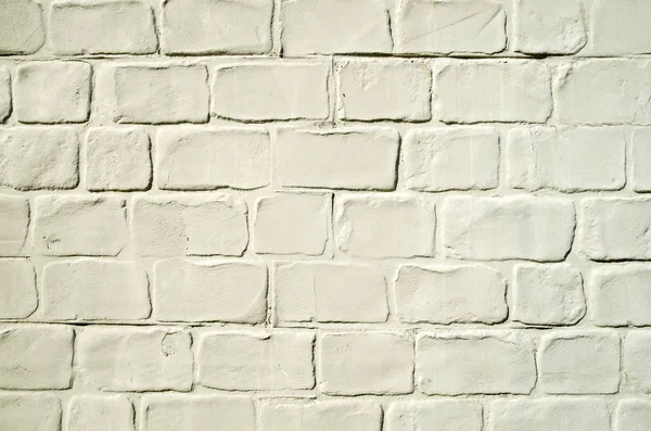 Stuc jaune décoratif imitant mur de briques — Photo
