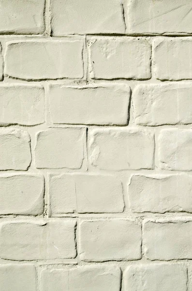 Stuc jaune décoratif imitant mur de briques — Photo