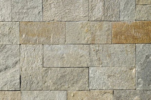 New stone wall closeup  in sun — Stock Photo, Image