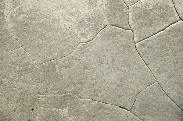 Ecru sandstone with cracks closeup — Stock Photo, Image