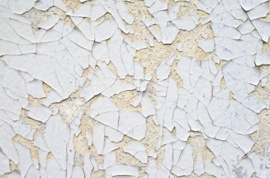 Beyaz ve turuncu boya bir duvara kırık 