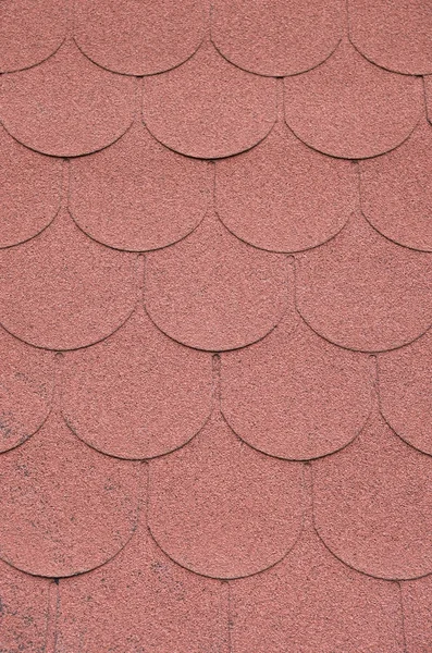 Roof with red bitumen shingles closeup — Stock Photo, Image