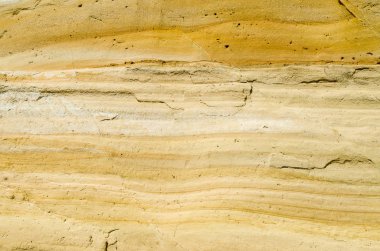 Çatlaklar closeup ile sarı bir kumtaşı