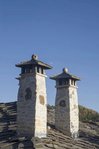 New two stone chimneys with stone balls — ストック写真