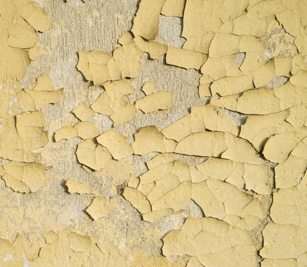 Old Wall Painted Yellow Oil Cracked Paint Closeu — Stock Photo, Image