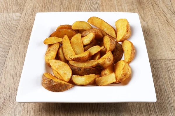 Potato Wedges White Square Plate Wooden Background — Stock Photo, Image