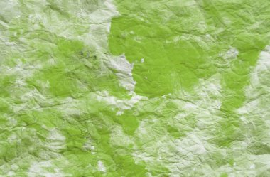 Buruşmuş kağıdın dağınık kaplaması.