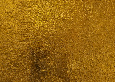 Kalıplı ve parlak yüzeyi olan altın arkaplan