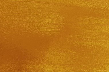 Kalıplı ve parlak yüzeyi olan altın arkaplan