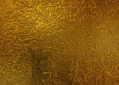 Kalıplı ve parlak yüzeyi olan altın arkaplan