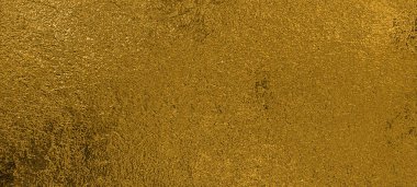 Kalıplı ve parlak yüzeyi olan altın arkaplan