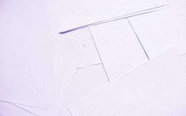 A4 kağıtlarının dağıtıldığı yaratıcı bir arkaplan.