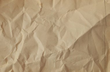 Buruşmuş kağıtlarla kaplanmış yaratıcı bir arka plan..