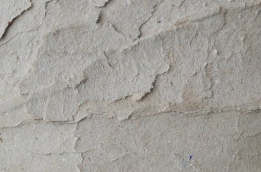 Buruşmuş kağıtlarla kaplanmış yaratıcı bir arka plan..