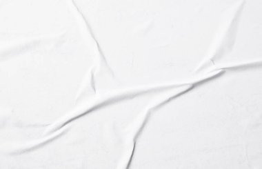 Buruşmuş kağıtlarla kaplanmış yaratıcı bir arka plan..