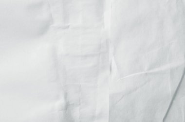 Buruşmuş kağıtlarla kaplanmış yaratıcı bir arka plan..