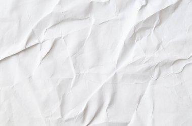 Buruşmuş kağıtlarla kaplanmış yaratıcı bir arka plan..