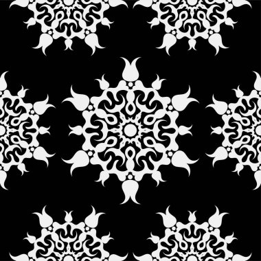 Kusursuz desenli, siyah arkaplanda doğulu altın süs..