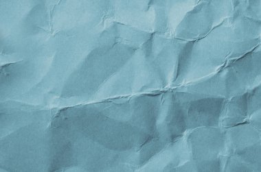 Kırışmış beyaz kağıdın dağınık kaplamasına sahip yaratıcı bir zemin.