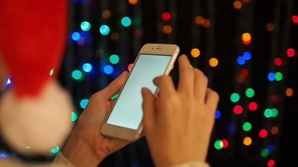 Используйте смартфон Рождество — стоковое видео