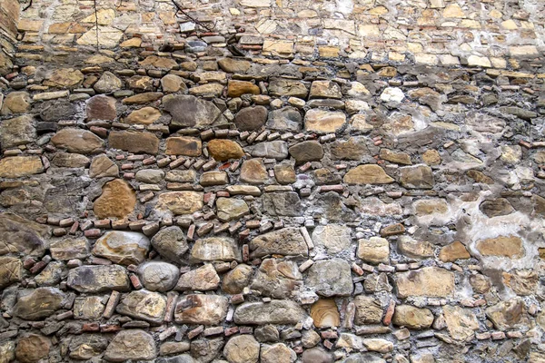 Fondo de la antigua muralla de mampostería del castillo fortificado de Ananuri —  Fotos de Stock