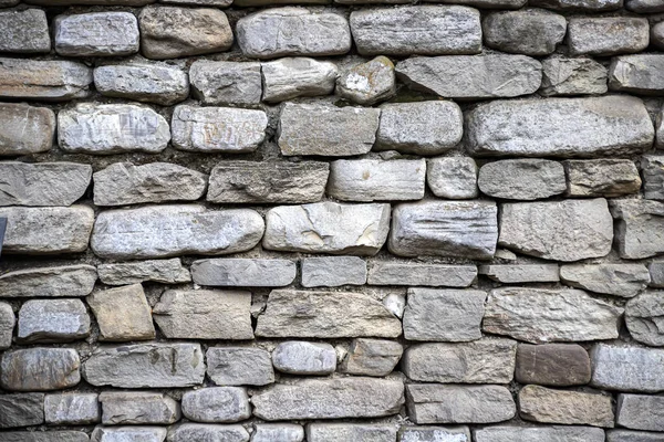 Abstrakcyjna powierzchnia ścian murowanych z szarych kamieni teksturowanych — Zdjęcie stockowe
