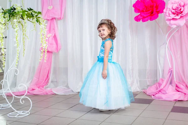 Little girl in blue dress — Stock Photo, Image