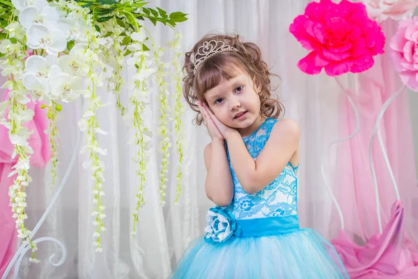 Little girl in blue dress — Stock Photo, Image