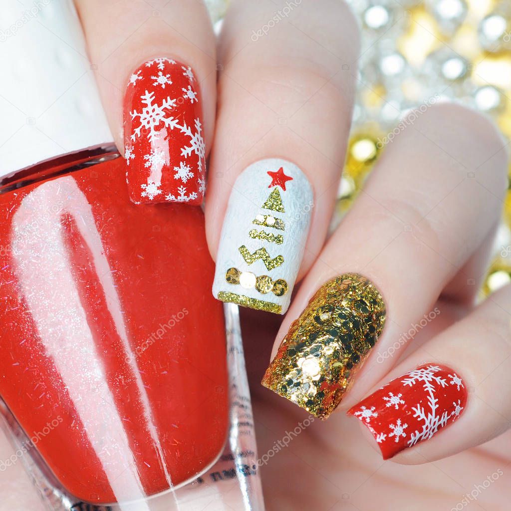 christmas manicure with snowflakes and christmas tree