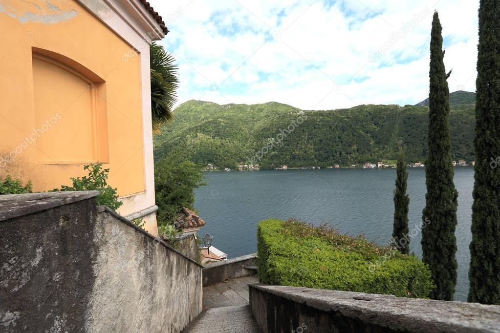 Lake Lugano viewed from Santa Maria del Sasso, cathedral of Morcote in Switzerland