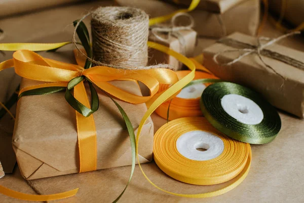 Gift box packaging. Kraft wrapping paper and natural twine. Recycling material. Happy holiday present, surprise. Gifts for boxing day. Delivery service, shipping. Handwork art craft. Celebration event