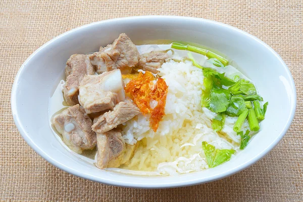 Boiled rice with pork rib hot soup on bowl — Stock Photo, Image