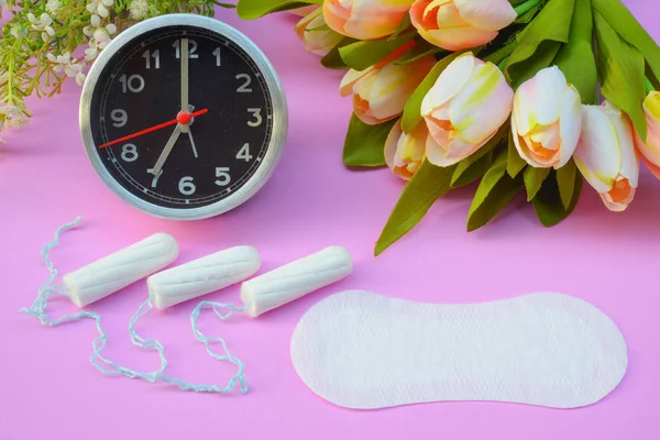 Sanitary napkins, pad (sanitary towel, sanitary pad, menstrual pad) on pink background.