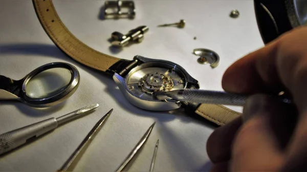 mechanical watch repair, watch repairing