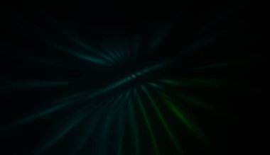 Hareket halindeki ışık parçacıkları, siyah arkaplanda parlayan çok renkli ışınlar yaratıyor. Enerji dolu parıldayan ışıklar duvar kağıdı.