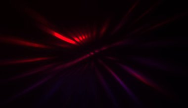 Hareket halindeki ışık parçacıkları, siyah arkaplanda parlayan çok renkli ışınlar yaratıyor. Enerji dolu parıldayan ışıklar duvar kağıdı.