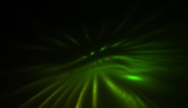 Hareket halindeki ışık parçacıkları, siyah arkaplanda parlayan çok renkli ışınlar yaratıyor. Enerji dolu parıldayan ışıklar duvar kağıdı.