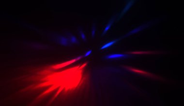 Hareket halindeki ışık parçacıkları, siyah arkaplanda parlayan çok renkli ışınlar yaratıyor. Enerji dolu parıldayan ışıklar duvar kağıdı.