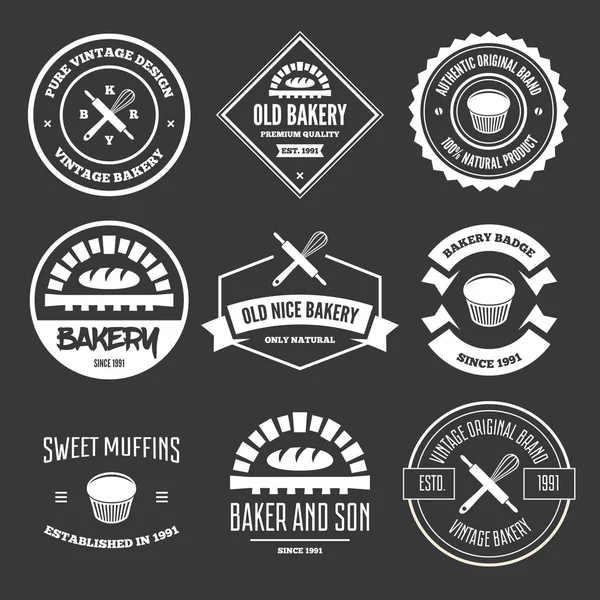 Set of bakery and bread logos, labels, badges or design elements — Stock Vector